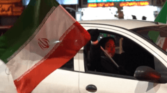 Watch: Iranians gather in Tehran following...